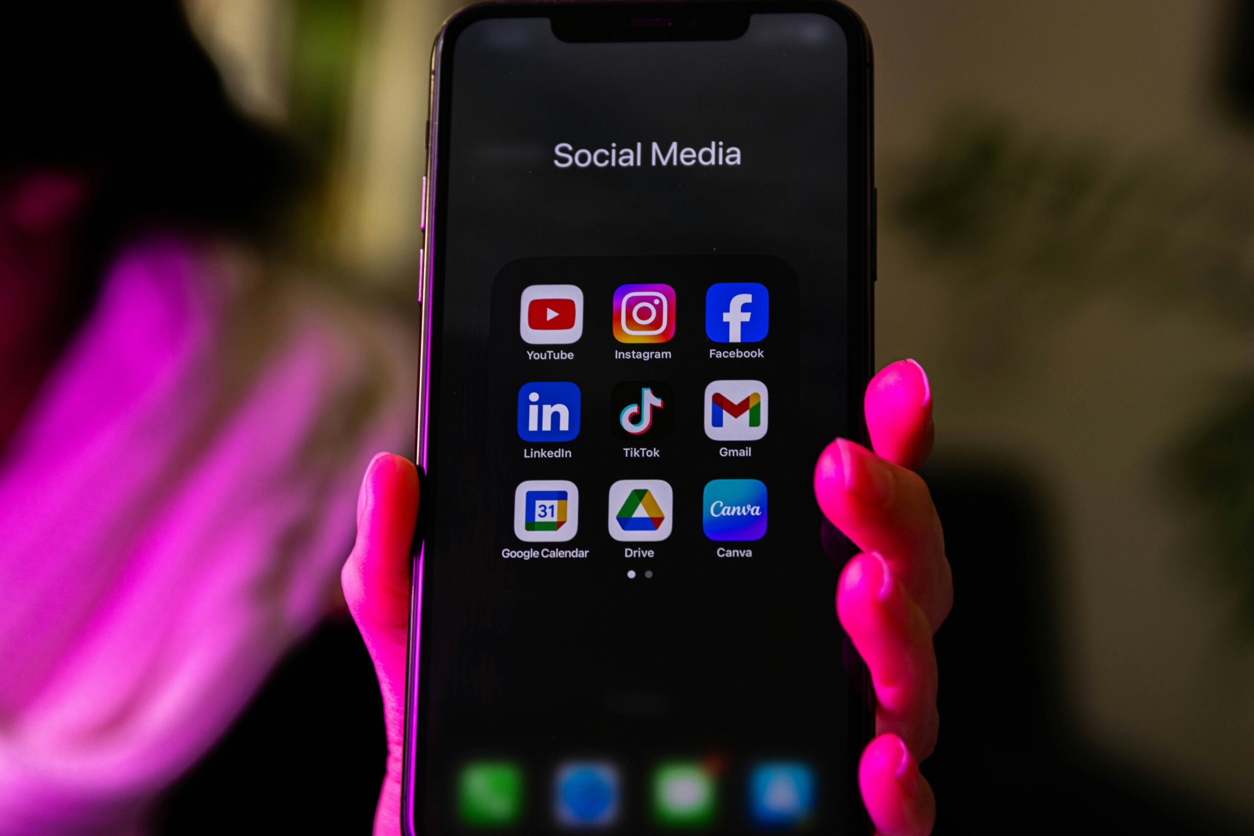 Smartphone displaying social media apps for digital marketing and business growth